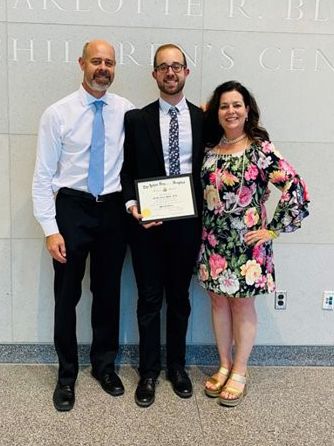 Brad Muller at his graduation with family