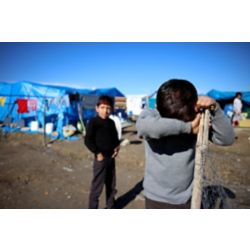 Sad child in refugee camp