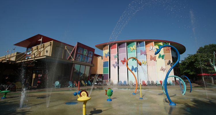Memphis Children's Museum colorful exterior water feature built for children to play.