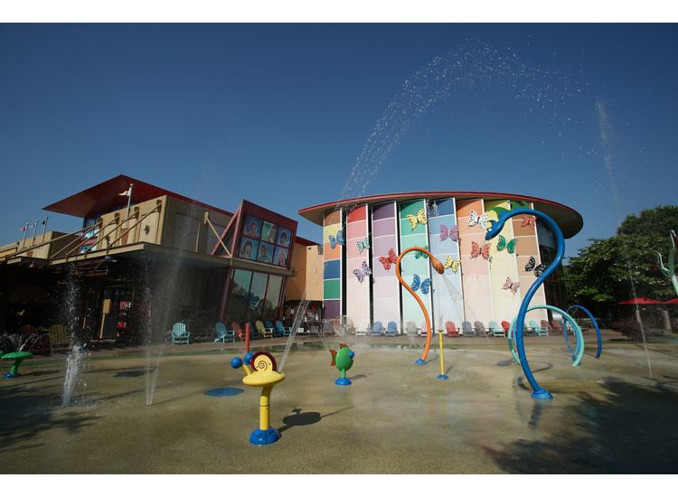 Memphis Children's Museum colorful exterior water feature built for children to play.