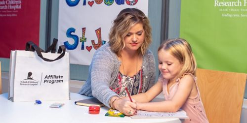 Woman and child coloring