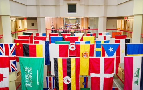 International flags hanging in the Danny Thomas Research Tower atrium.