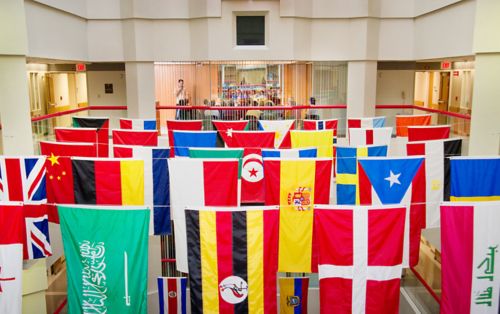 International flags hanging in the Danny Thomas Research Tower atrium.