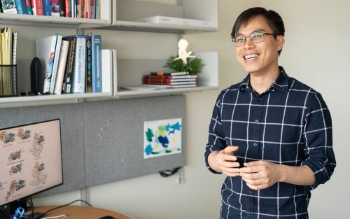 Photo of Hai T. Dao smiling in his office