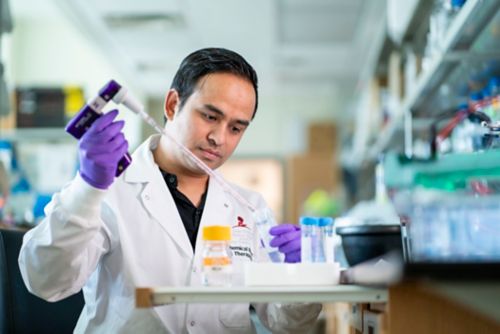 photo of man in lab