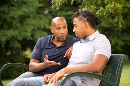 Parent having a conversation with son