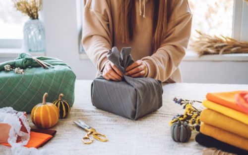 Woman wrapping gifts