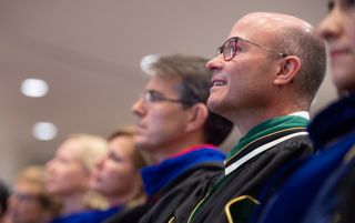 Faculty in audience.