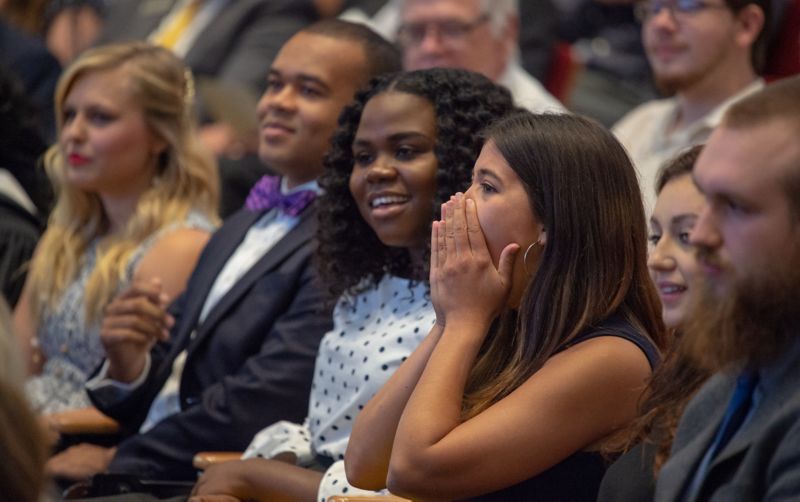 Audience reacting to speaker.