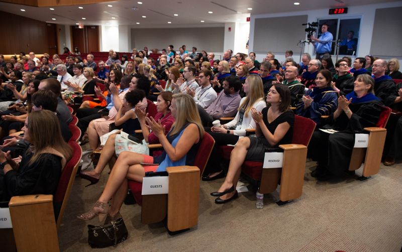 Auditorium full of people