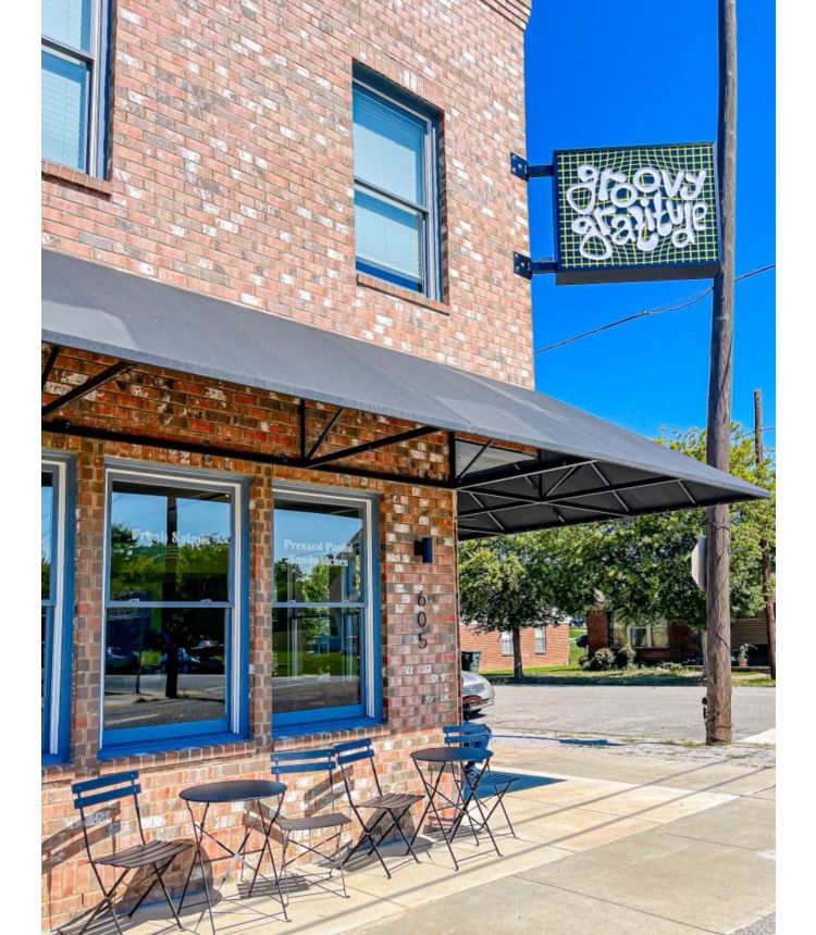 exterior of building with Cafe Keough sign