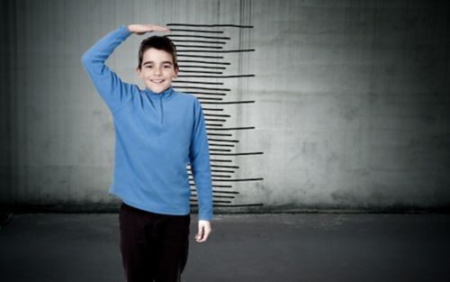 Boy with growth chart