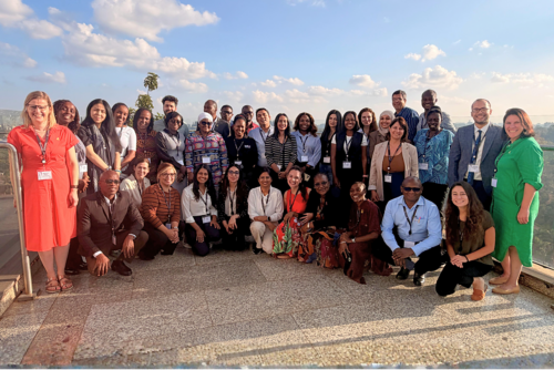 large group of people posing for a photo