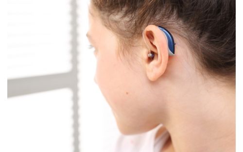 Child wearing hearing aid