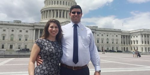 Man and woman  outside U.S. Capitol