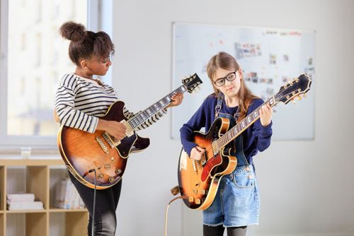 Siblings staying connected with doing their hobbies together