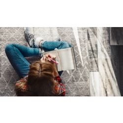 Woman writing in notebook