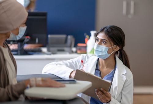 Doctor with palliative care patient