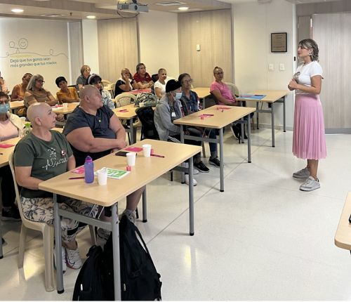 Isabella giving presentation in classroom