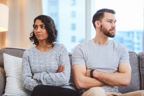 Young couple turning away from each other