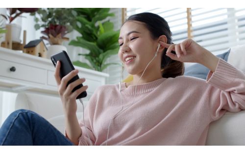 stock image of girl looking at phone