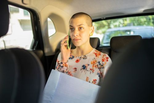 Woman on phone in car