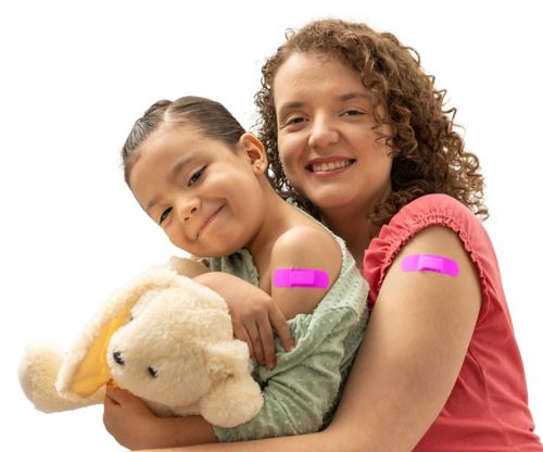 mother and daughter with pink band aid smiling after having an injection