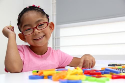 4-year-old girl coloring