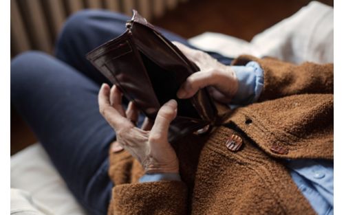 Person holding empty billfold