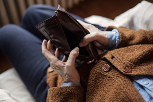 Person holding empty billfold