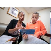 Nurse practitioner Sandra Jones with patient Anna Paula