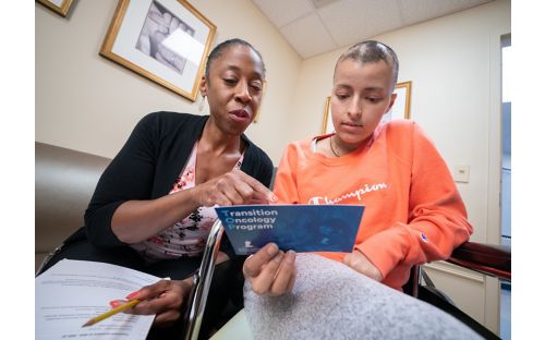 Nurse practitioner Sandra Jones with patient Anna Paula