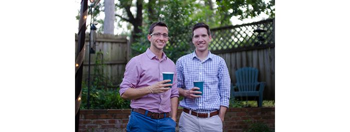 Two male lab members at backyard lab party