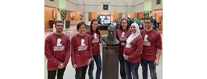 Lab members pose indoors at St. Jude Marathon