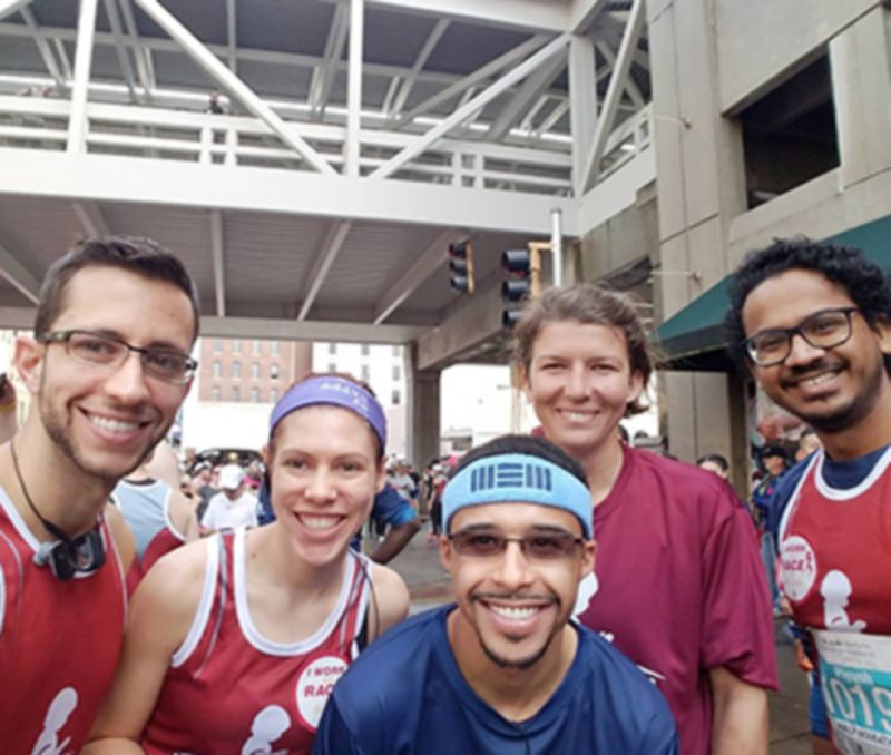Lab members pose outdoors together at St. Jude Marathon
