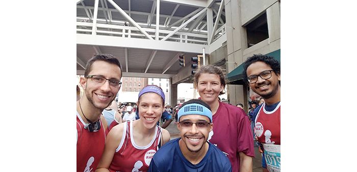 Lab members pose outdoors together at St. Jude Marathon