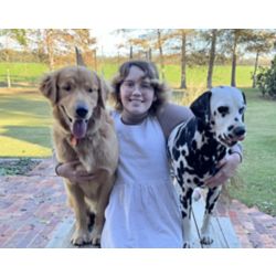 Maddy with two of her dogs