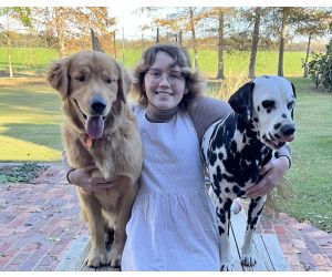 Maddy with two of her dogs