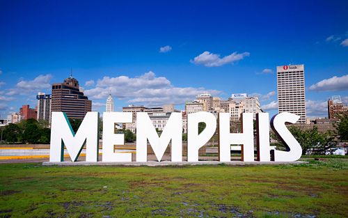 The Memphis sign with downtown Memphis in the background.