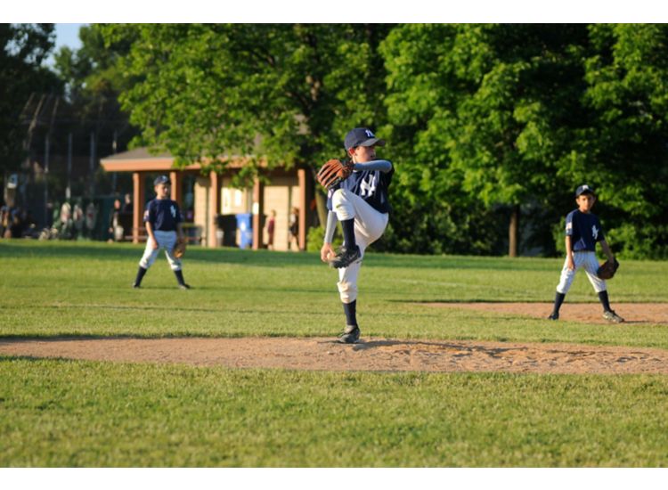 photo of boys playing baseball.