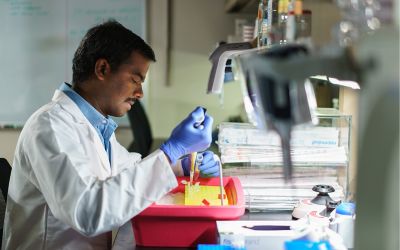 Photo of scientist in lab working