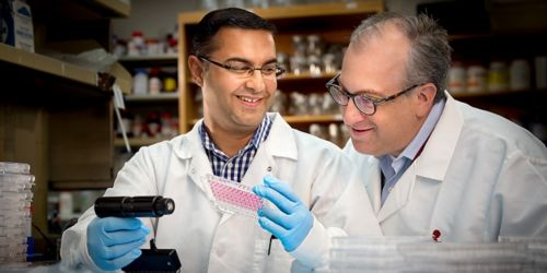 Photo of Amit Budhraja (left), PhD, and Joseph Opferman, PhD, 