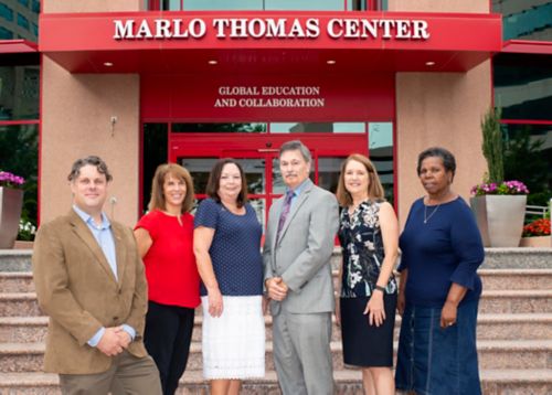 Group of people standing in front of Marlo Thomas Center