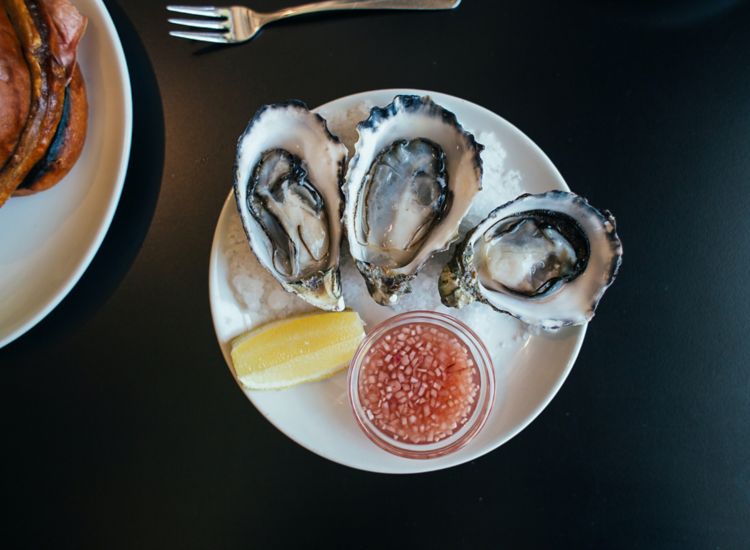 photo of plate of oysters on the half-shell