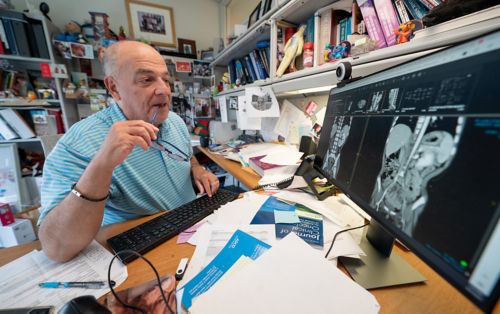 photo of Alberto Pappo working at a computer