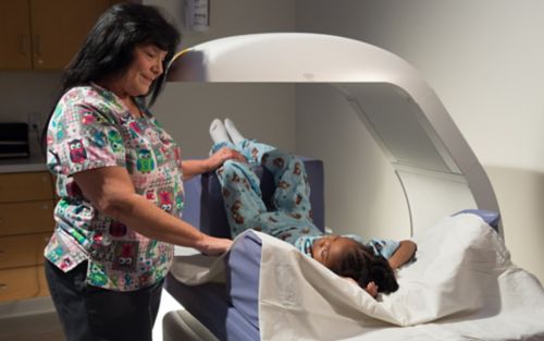 Nurse with patient who is getting a scan