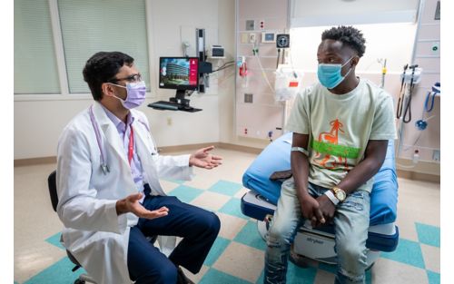 Doctor speaking with patient