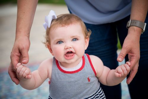 As part of normal physical development, your child may pulls up to stand, and walk while holding on to furniture (which is called “cruising”).