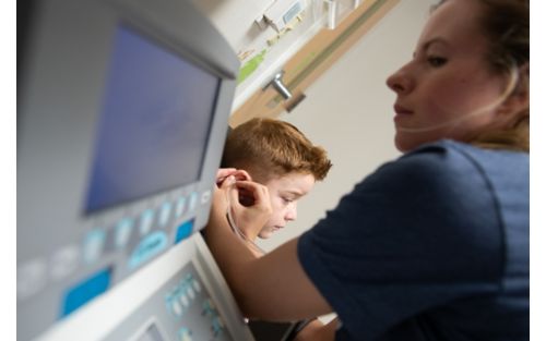 Child undergoing hearing test