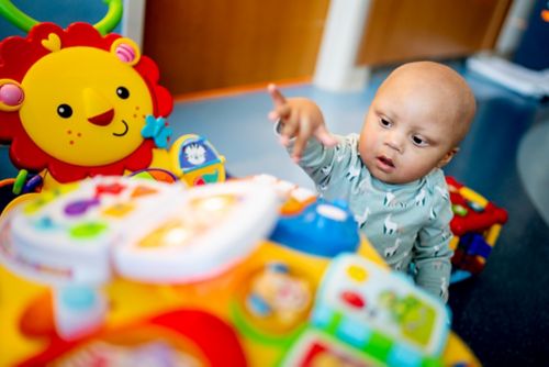 As part of normal learning development, your child may be able to watch the path of something as it falls.